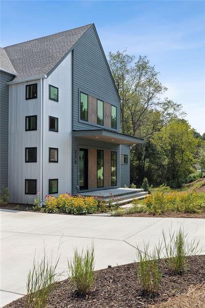 Front exterior of a new home in Aster, Roswell, GA, highlighting curb appeal (Image 36).