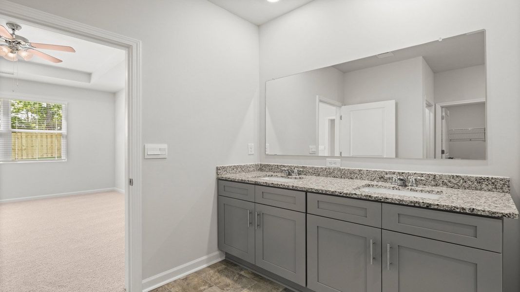 Representative furnished interior of a home built from the Cali by D.R. Horton in Highland Hills, Graniteville (Image 8).