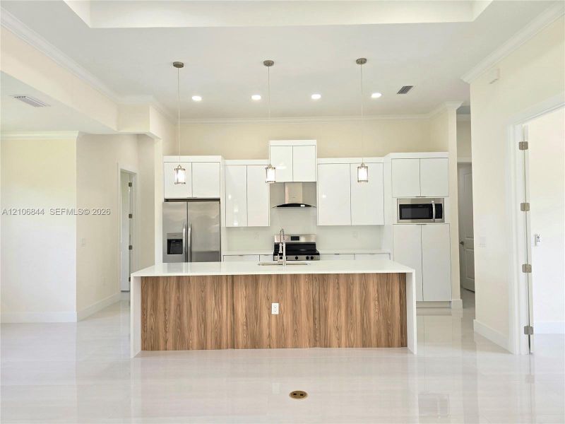 Furnished interior view inside a new home in , Lehigh Acres (Image 6). Furnished interior view inside a new home in , Lehigh Acres (Image 6).