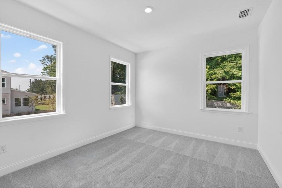 Spacious, unfurnished interior of a new home in Nichols Farm, Dacula (Image 39).
