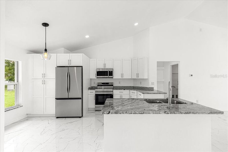Furnished interior view inside a new home in , Summerfield (Image 11).