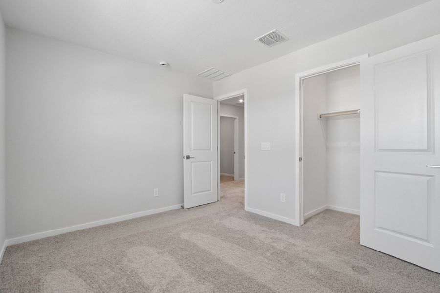 A room with white doors.