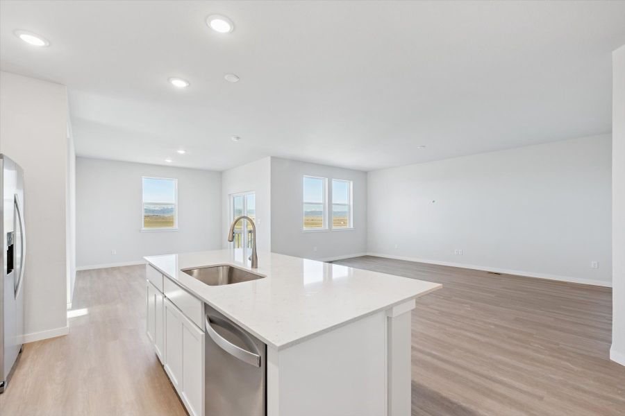 A kitchen with white cabinets. A kitchen with white cabinets.