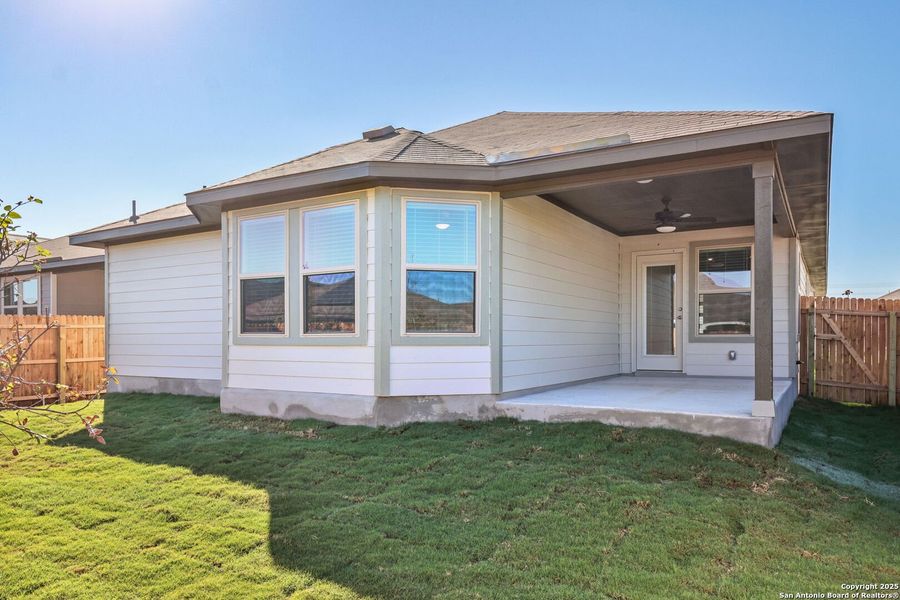 Exterior details and patio area of a home in Catalina, Converse (Image 26).