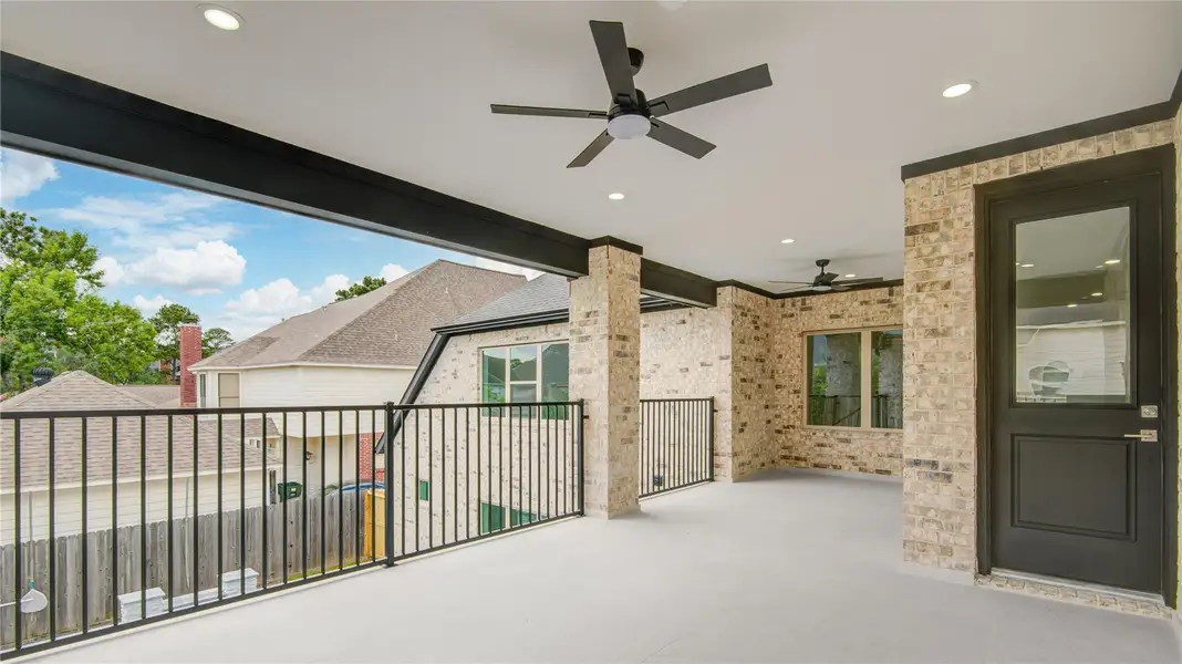 Exterior details and patio area of a home in , Spring (Image 25).
