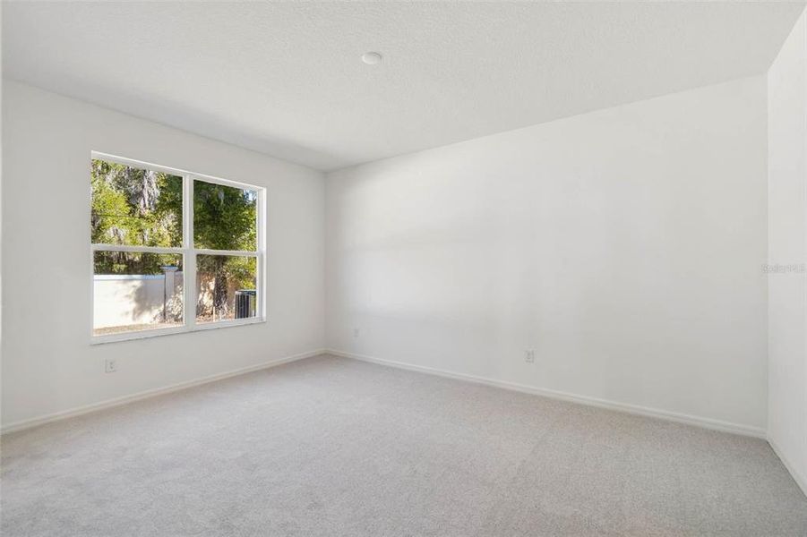 Spacious, unfurnished interior of a new home in Cascades at Southern Hills, Brooksville (Image 52).