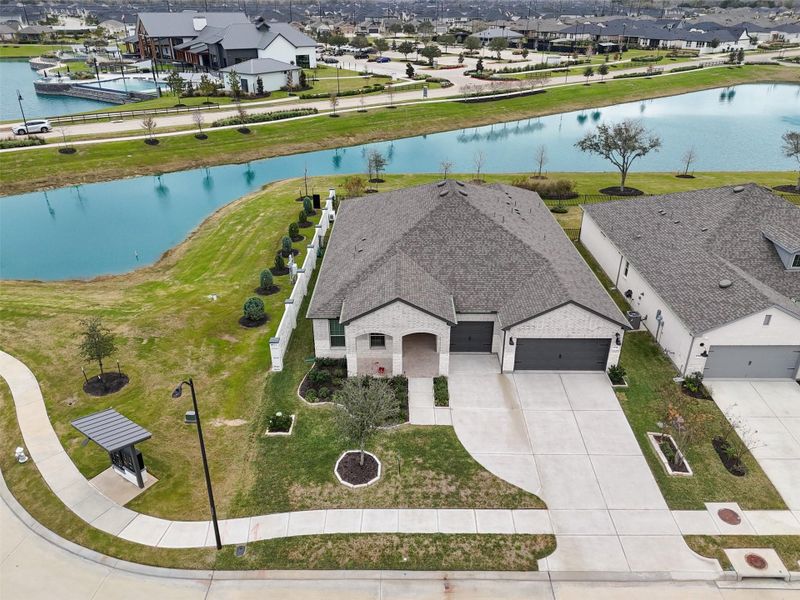 Aerial view of the cul-de-sac home with no neighbor and the pond behind. Note the mailbox is convenient!
