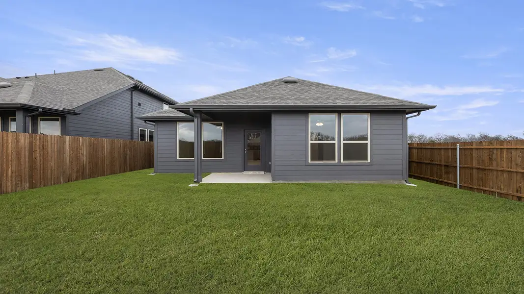 Exterior details and patio area of a home in Keeneland 40s, Aubrey (Image 4).
