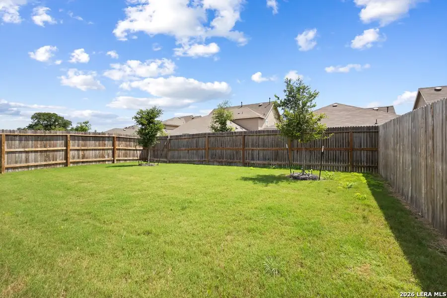 Exterior details and patio area of a home in Brookstone Creek, San Antonio (Image 3).