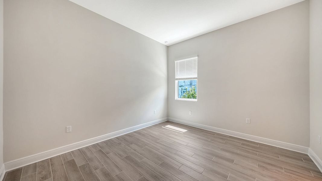 Spacious, unfurnished interior of a new home in Canoe Creek Real Estate and Homes for Sale in Parrish, FL - Neal Communities, Parrish (Image 50).