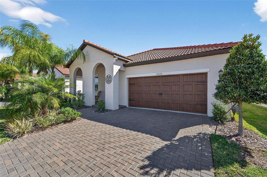 Front exterior of a new home in Southshore Bay Active Adult, Wimauma, FL, highlighting curb appeal (Image 24).