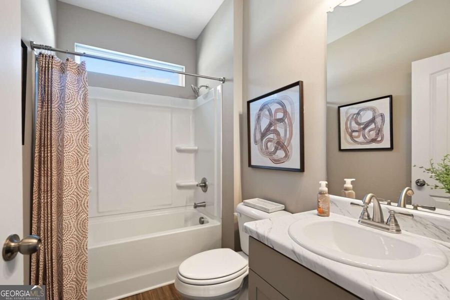 Furnished interior view inside a new home in Cobblestone Crossing Commons, Byron (Image 6).
