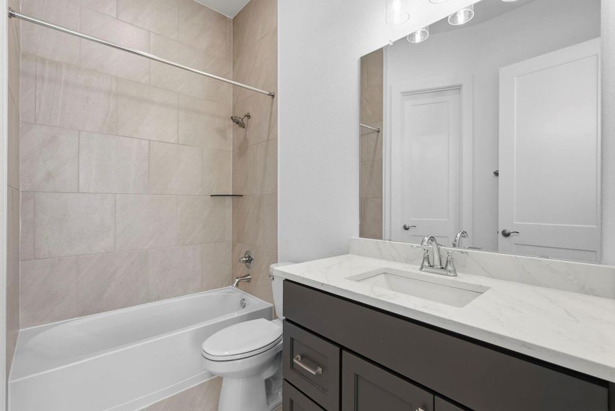 Furnished interior view inside a new home in Meridiana, Manvel (Image 5).