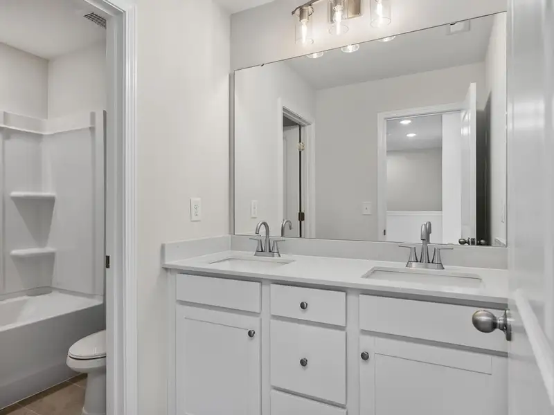Furnished interior view inside a new home in Forestville Yard Townhomes, Knightdale (Image 9).