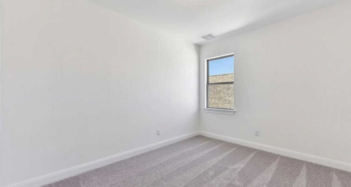 Spacious, unfurnished interior of a new home in 6 Creeks, Kyle (Image 15).