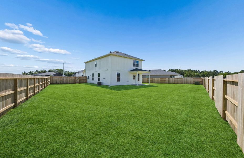 Exterior details and patio area of a home in Windcress, Cove (Image 24).