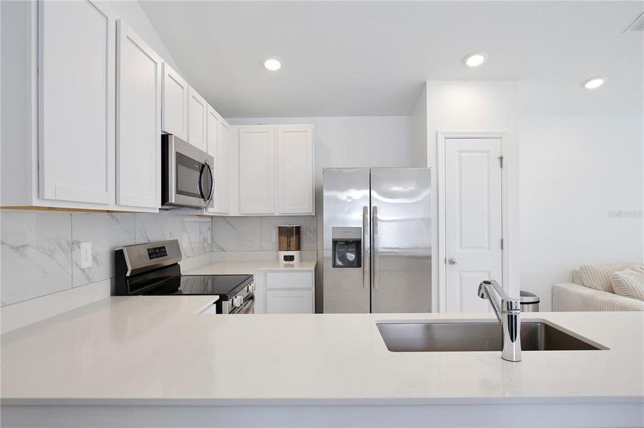 Furnished interior view inside a new home in Peace Creek Reserve, Winter Haven (Image 8).