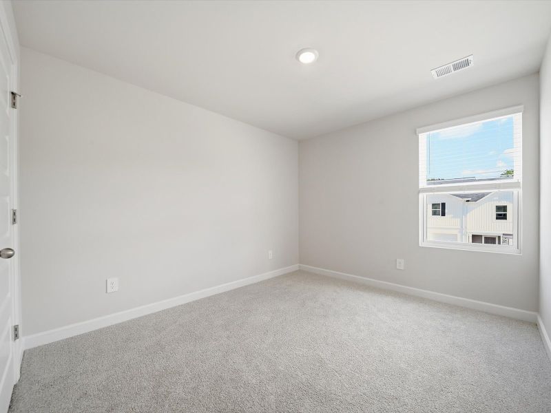 Spacious, unfurnished interior of a new home in Northbrook Village Townes, Taylors (Image 15).