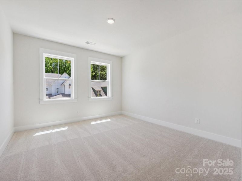 Spacious, unfurnished interior of a new home in North Creek Village, Huntersville (Image 19).