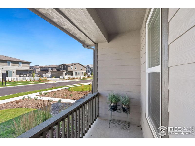 Front Yard Opens to Quiet Street and Open Space