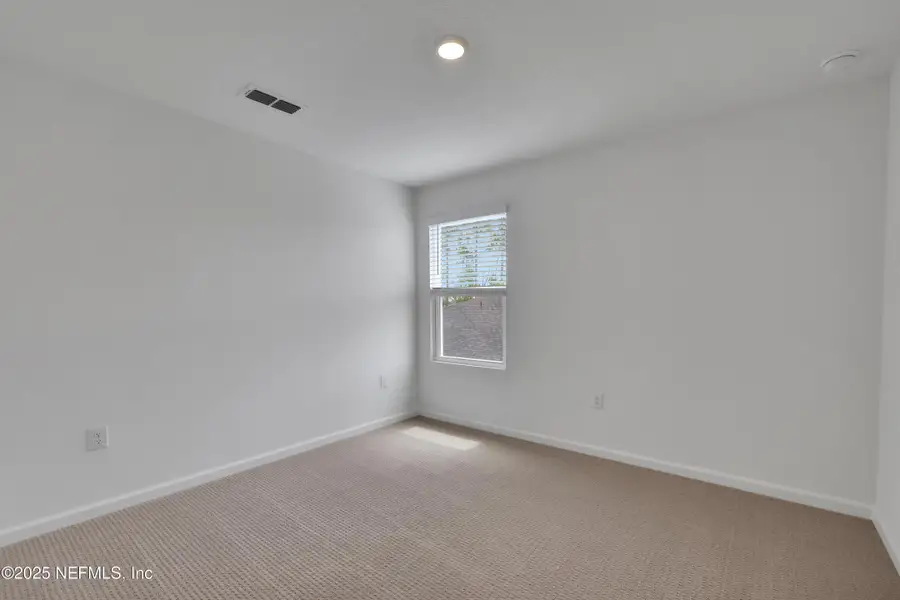 Spacious, unfurnished interior of a new home in Cordova Palms, St. Augustine (Image 13).