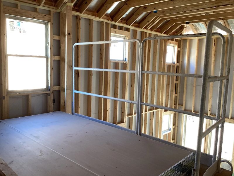 In-progress construction of a new home in The Homestead at Lariat, Liberty Hill, TX (Image 13).