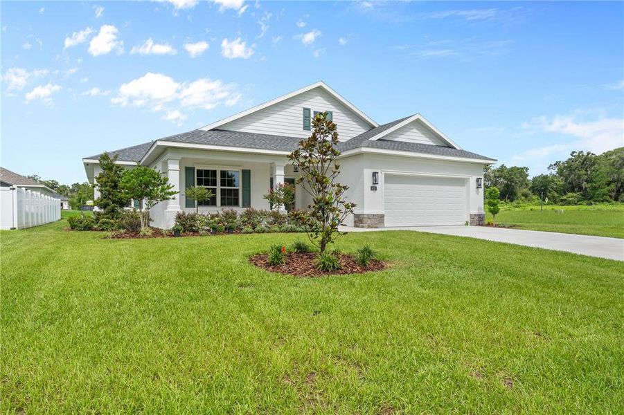 Front exterior of a new home in , Ocala, FL, highlighting curb appeal (Image 28).