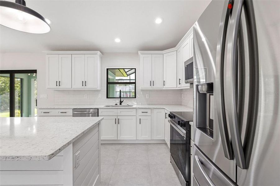 Furnished interior view inside a new home in , Port Charlotte (Image 12).