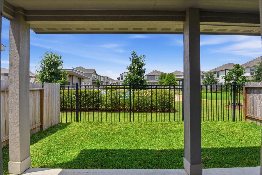 Exterior details and patio area of a home in Dunvale Village - Townhome Collection, Houston (Image 4).