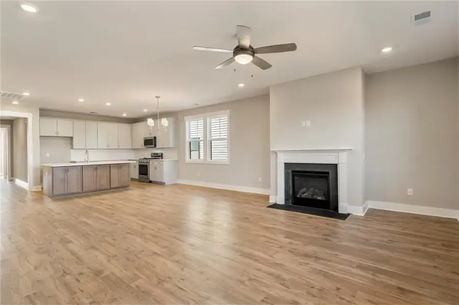 An open-concept living area combines a well-appoin