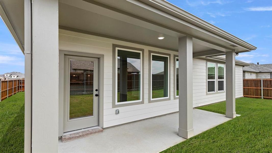 Exterior details and patio area of a home in Waterscape, Royse City (Image 3). Exterior details and patio area of a home in Waterscape, Royse City (Image 3).
