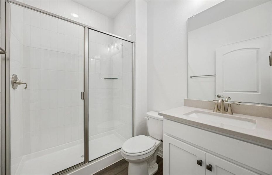Secondary bathroom with spacious shower