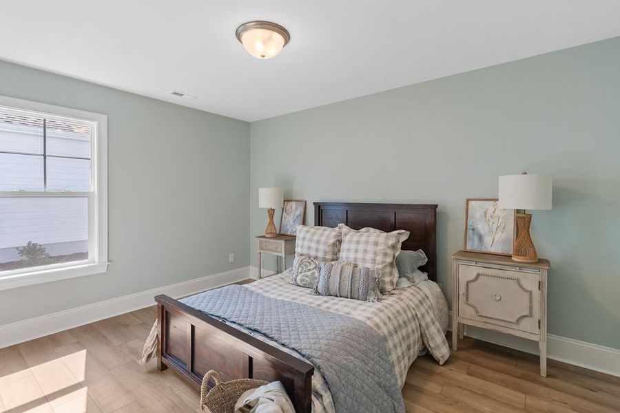 Representative furnished interior of a home built from the Salt Marsh by Bill Clark Homes in Osprey Landing, Southport (Image 29).