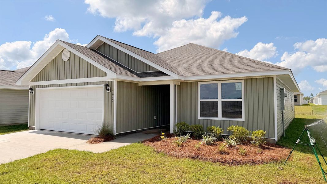 Front exterior of a new home in Liberty, Panama City, FL, highlighting curb appeal (Image 2). Front exterior of a new home in Liberty, Panama City, FL, highlighting curb appeal (Image 2).