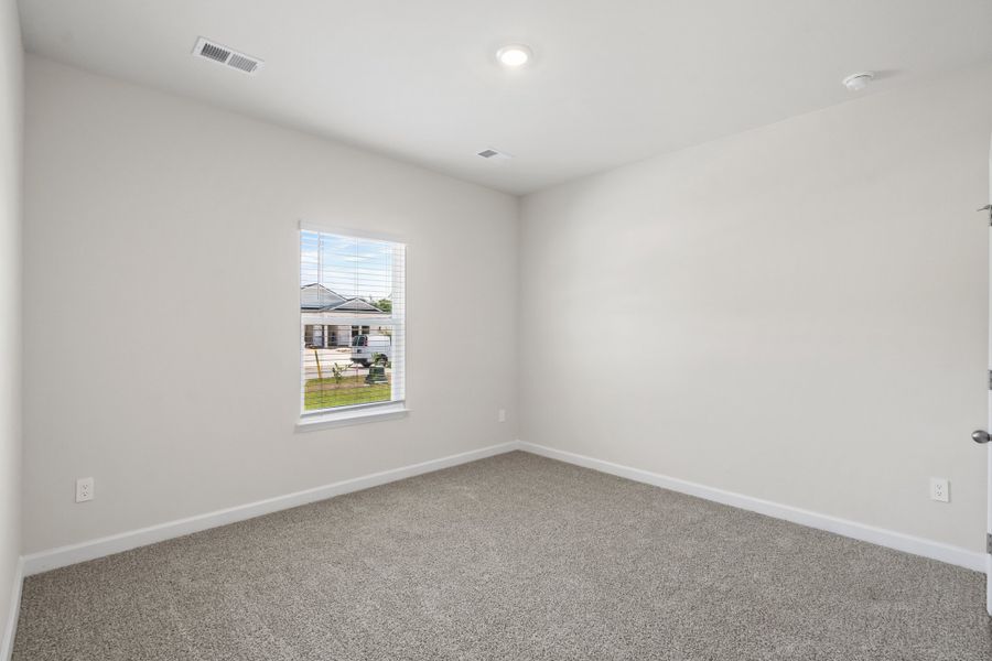 Spacious, unfurnished interior of a new home in Cypress Ridge - The Coastline Series, Longs (Image 25).