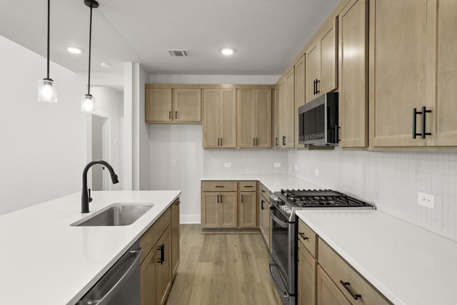 Furnished interior view inside a new home in Terrace Collection at Harvest, Argyle (Image 7).