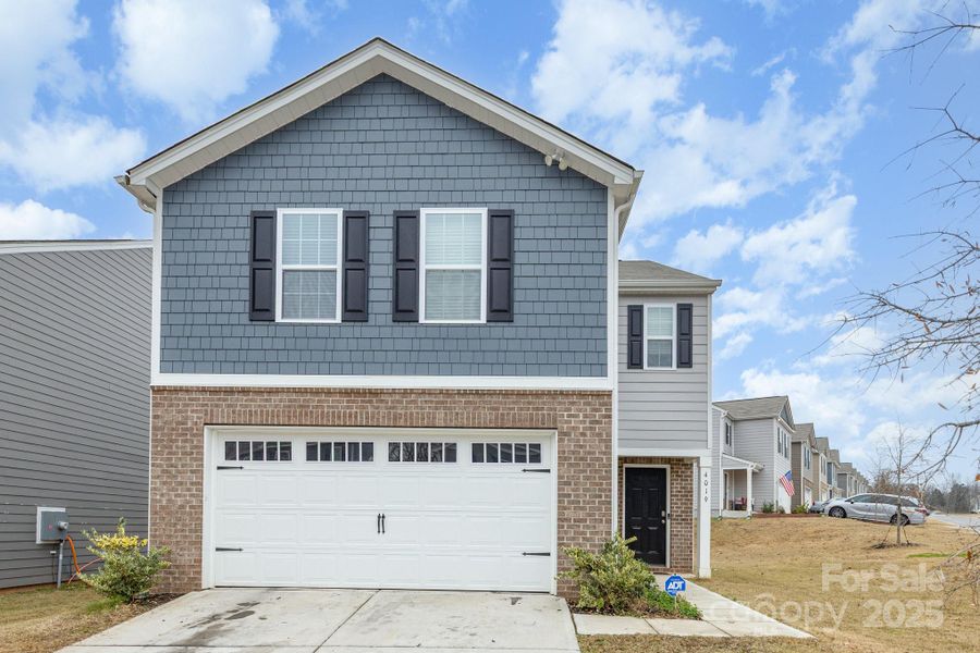 Front exterior of a new home in Abrial Ridge, York, SC, highlighting curb appeal (Image 25). Front exterior of a new home in Abrial Ridge, York, SC, highlighting curb appeal (Image 25).