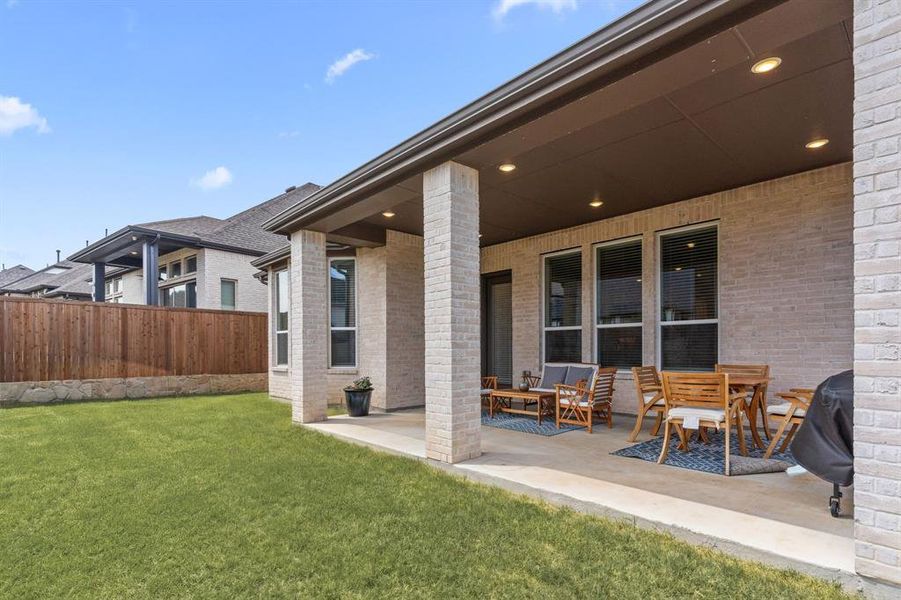 Wide covered patio can accommodate your outdoor living & dining furniture + has afternoon shade from the Texas sun. Wide covered patio can accommodate your outdoor living & dining furniture + has afternoon shade from the Texas sun.