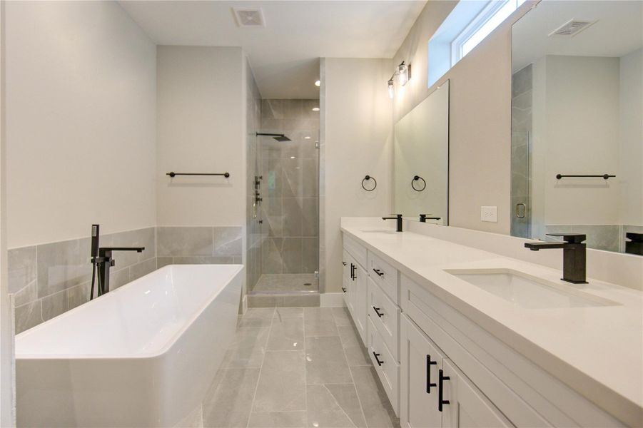 Primary spa like bath perfect to unwind.