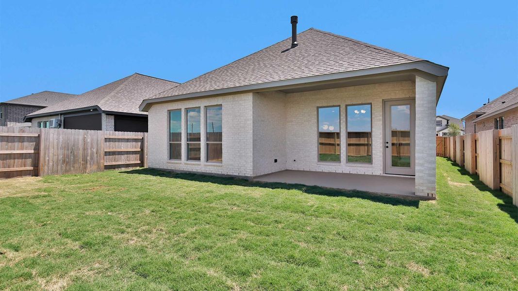 Exterior details and patio area of a home in Elyson, Katy (Image 3).