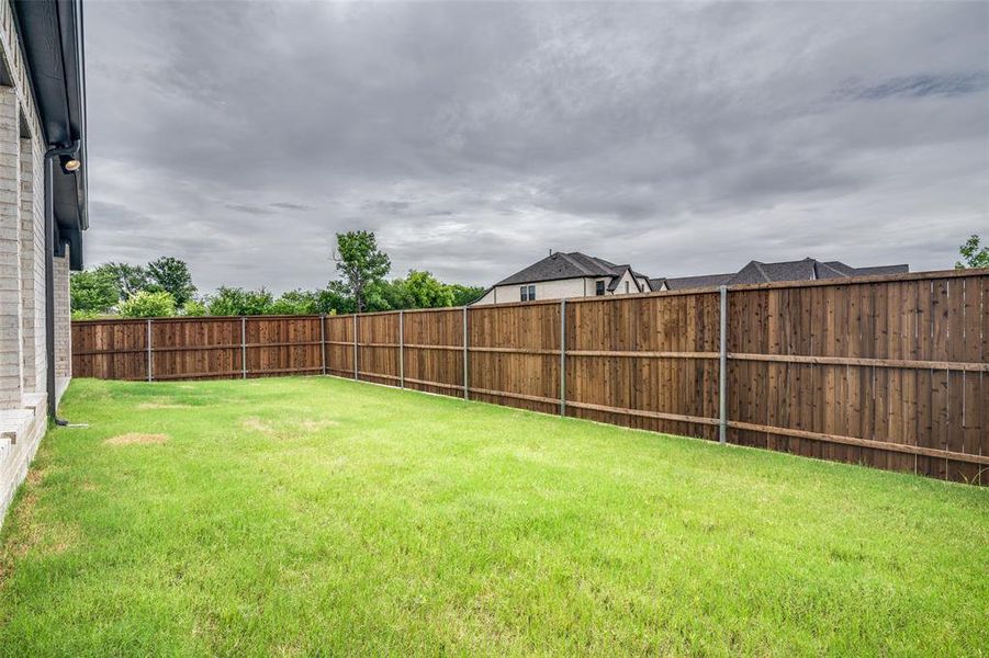 Exterior details and patio area of a home in Devonshire, Forney (Image 4).