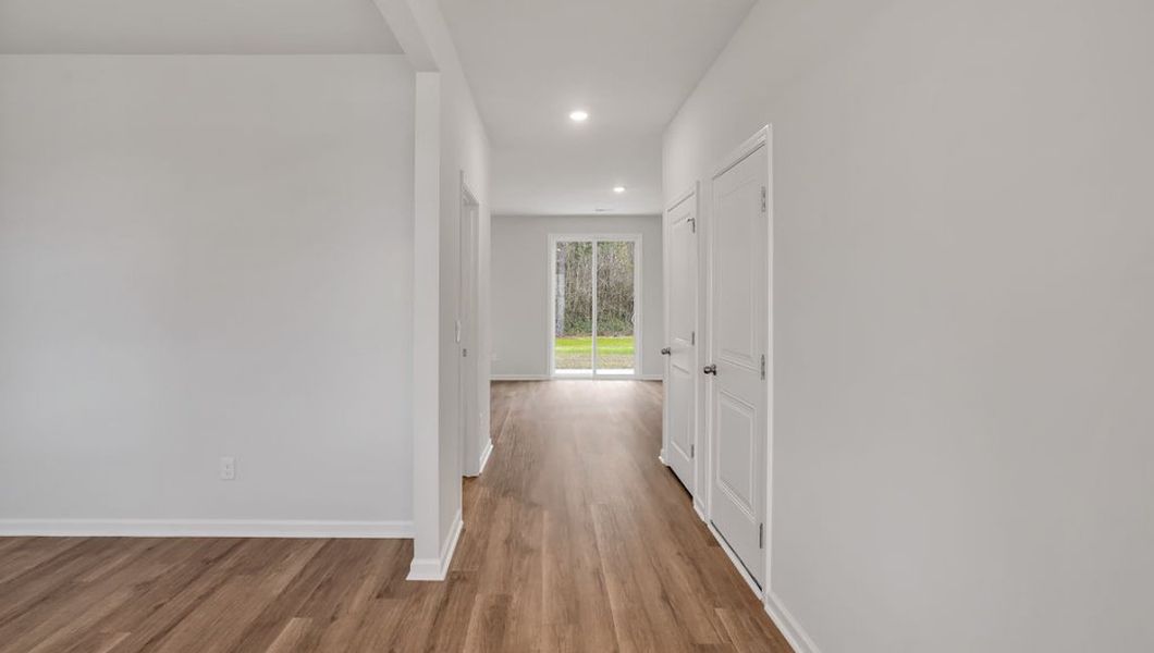 Representative unfurnished interior of a home built from the GLYNN by D.R. Horton in Grayson Park, Leland (Image 12).