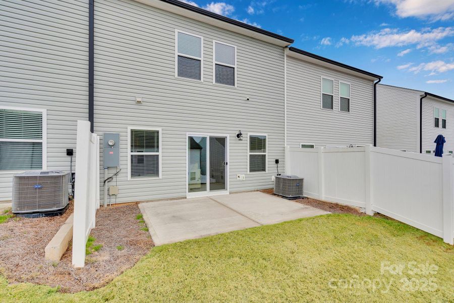 Exterior details and patio area of a home in , Charlotte (Image 3). Exterior details and patio area of a home in , Charlotte (Image 3).