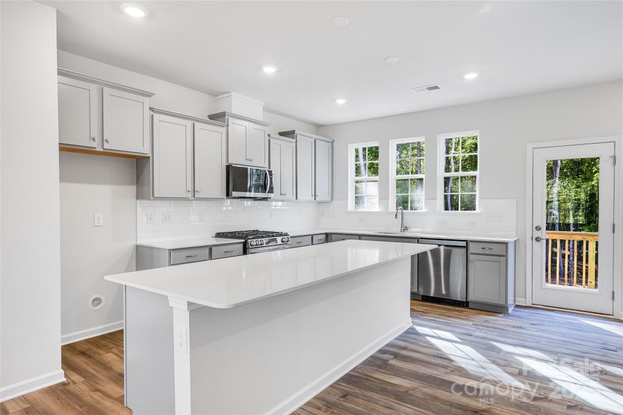 Furnished interior view inside a new home in Village of Waxhaw, Waxhaw (Image 4).