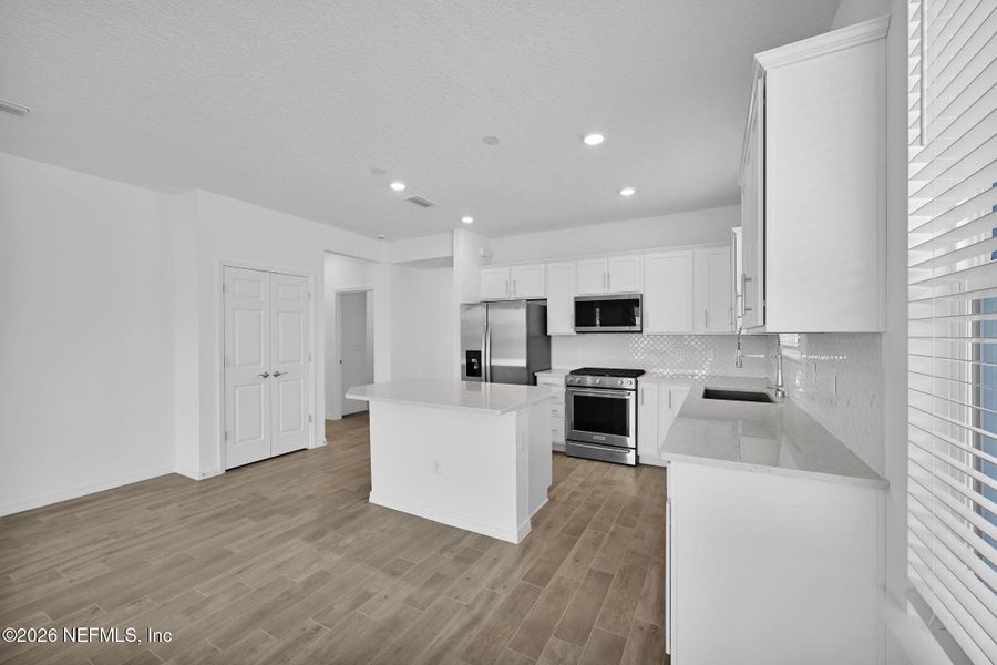 Furnished interior view inside a new home in Del Webb Wildlight, Yulee (Image 4).