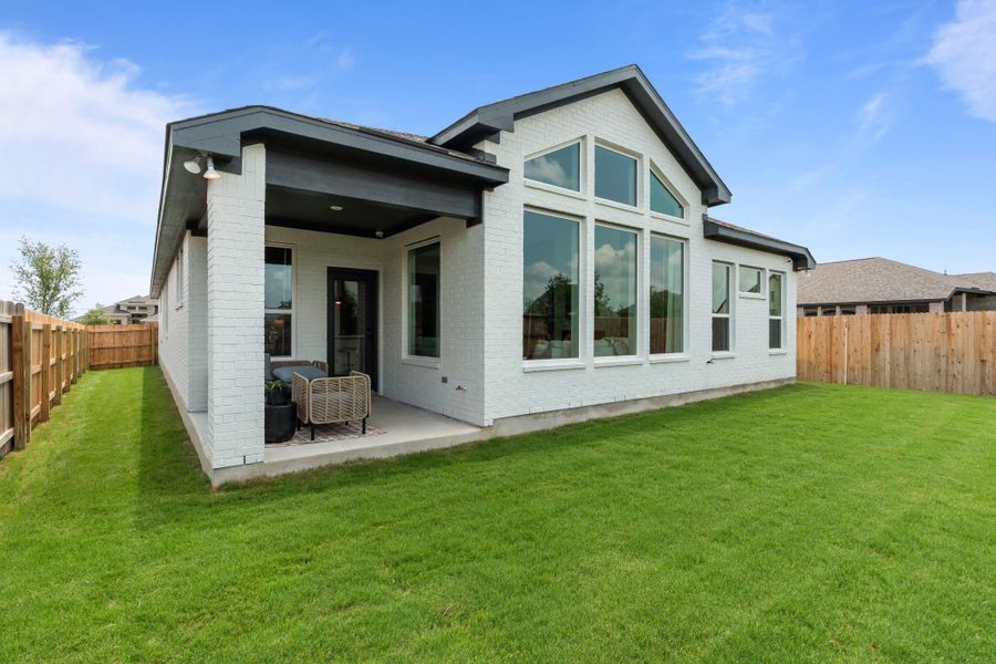 Representative exterior photo of a completed home built from the Morgan 50′ by Chesmar Homes in Esperanza – New Phase Now Selling, Boerne, TX (Image 2).