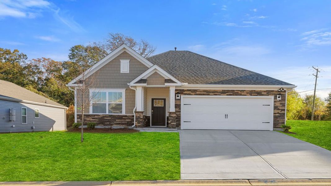 Front exterior of a new home in Bentley Park, Greenwood, SC, highlighting curb appeal (Image 1). Front exterior of a new home in Bentley Park, Greenwood, SC, highlighting curb appeal (Image 1).