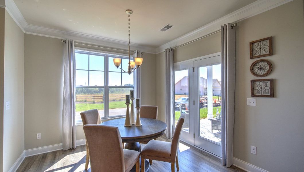 Furnished interior view inside a new home in Reserve at Tap Root Farms, Fletcher (Image 17).