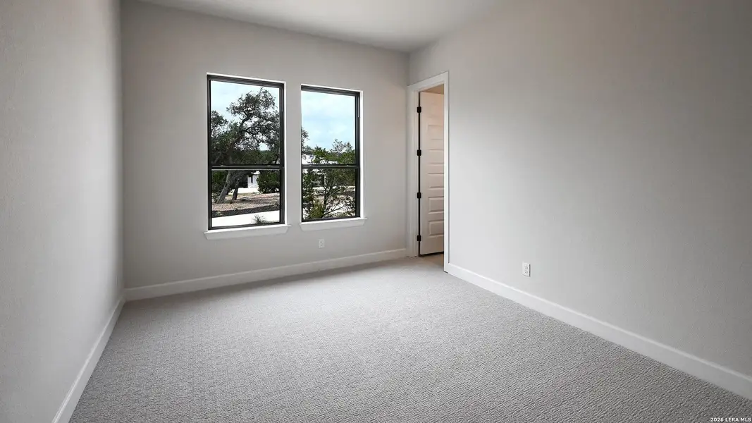 Spacious, unfurnished interior of a new home in The Preserve at Elm Creek, New Braunfels (Image 17).