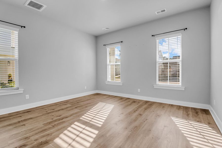 Spacious, unfurnished interior of a new home in Carnes Crossroads: Row Collection, Summerville (Image 27). Spacious, unfurnished interior of a new home in Carnes Crossroads: Row Collection, Summerville (Image 27).